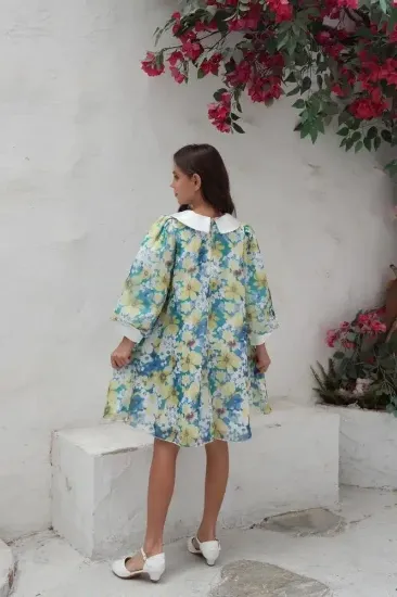 صورة فستان مورد باللوان متعددة